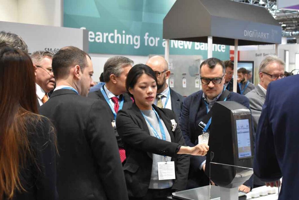 EuroCis visitors on exhibition stand