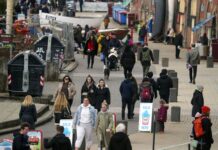 Retail footfall rises ahead of high street reopenings amid warm weather Spring People walk along the seafront in Brighton, East SussexApr 2nd 2021
