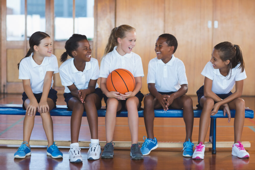 school kids having fun in basketball court 2021 08 28 17 58 04 utc