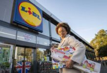 Customer donating toys to Lidl for Toy Bank Campaign