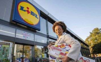 Customer donating toys to Lidl for Toy Bank Campaign