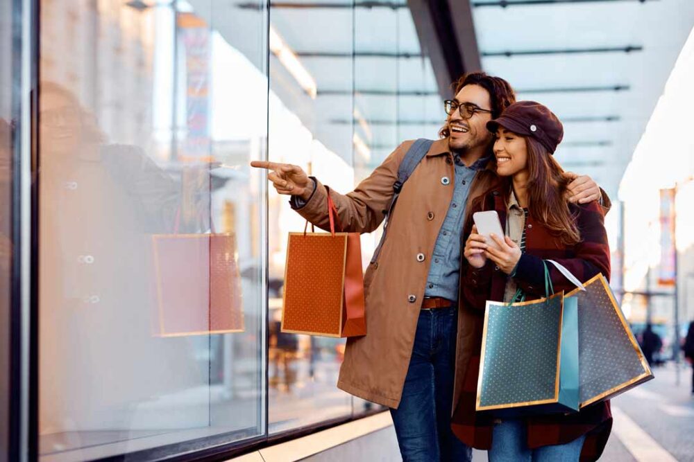 happy couple enjoying in window shopping in the ci 2023 01 18 04 27 49 utc