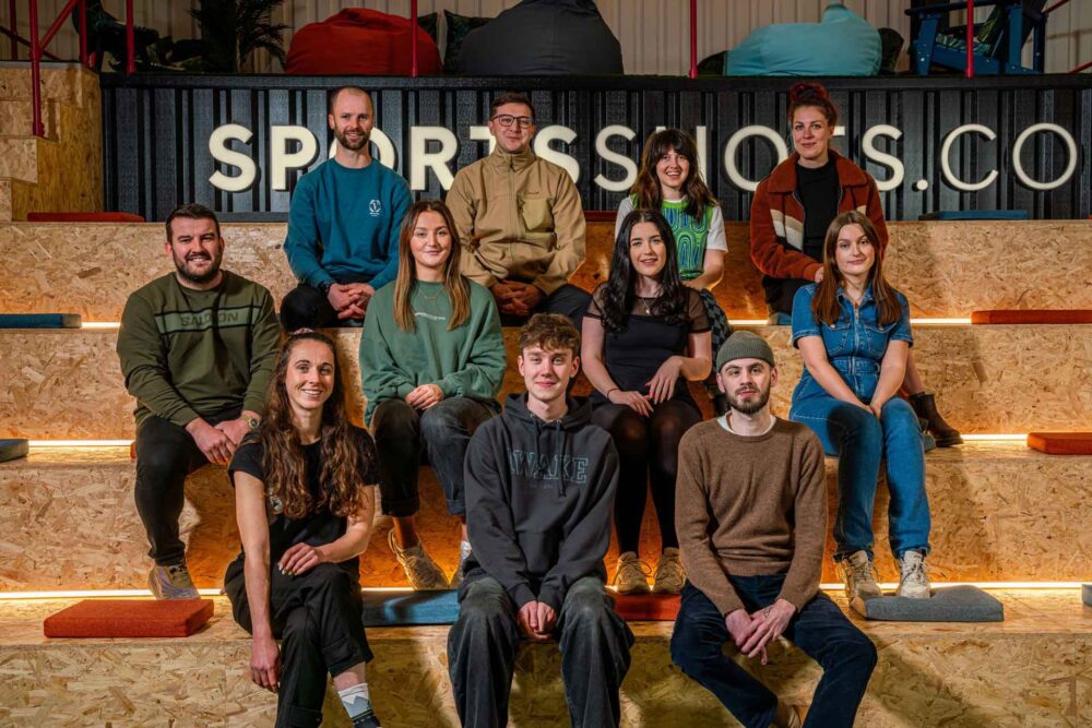 Team expansion Head of marketing Dan Cartner middle row far left welcomes the newest members of SportsShoes.coms marketing social media and design team
