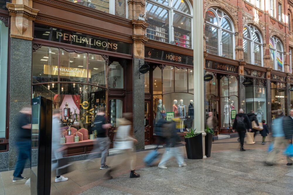 a group of people walking in Victoria Leeds