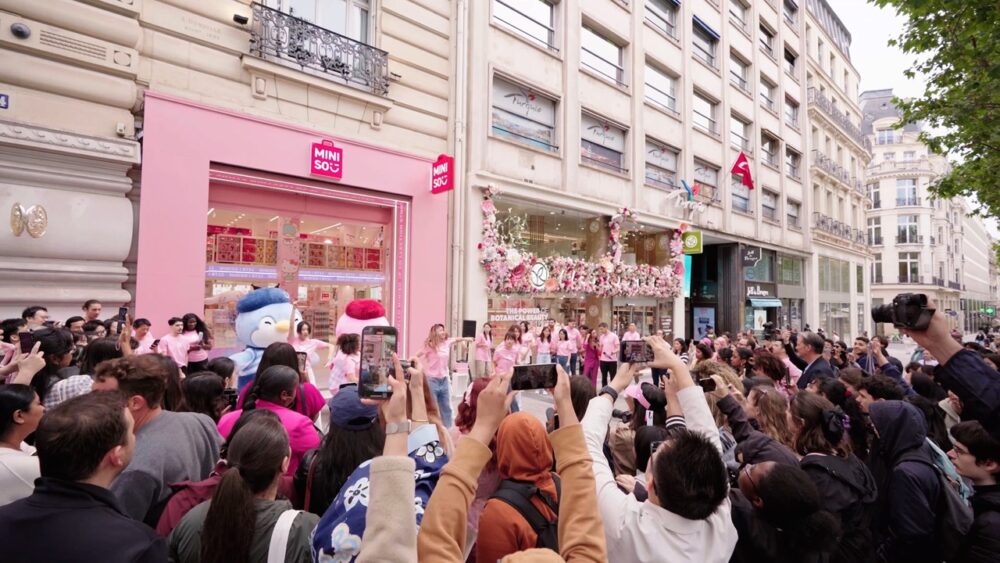 Crowds gathered for the MINISO Champs Elysees flagship grand opening Large