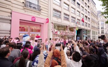 Crowds gathered for the MINISO Champs Elysees flagship grand opening Large
