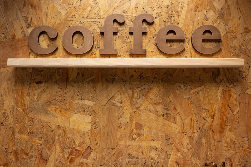 coffee letters at chipboard plywood background tex 2023 11 27 04 50 56 utc Large