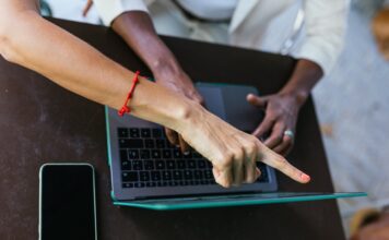 women working on laptops in street cafe 2023 11 27 05 18 24 utc Large