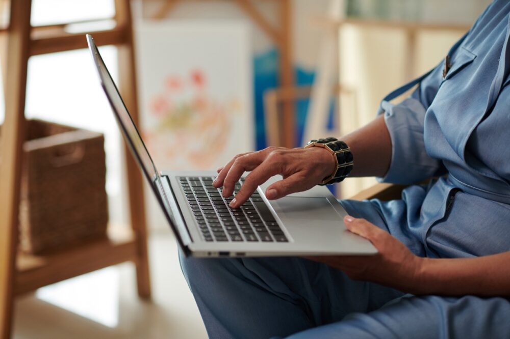 mature woman working on laptop 2023 11 27 05 30 47 utc Large