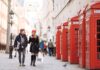 young shopping couple strolling past red phone box 2023 11 27 05 29 20 utc Large