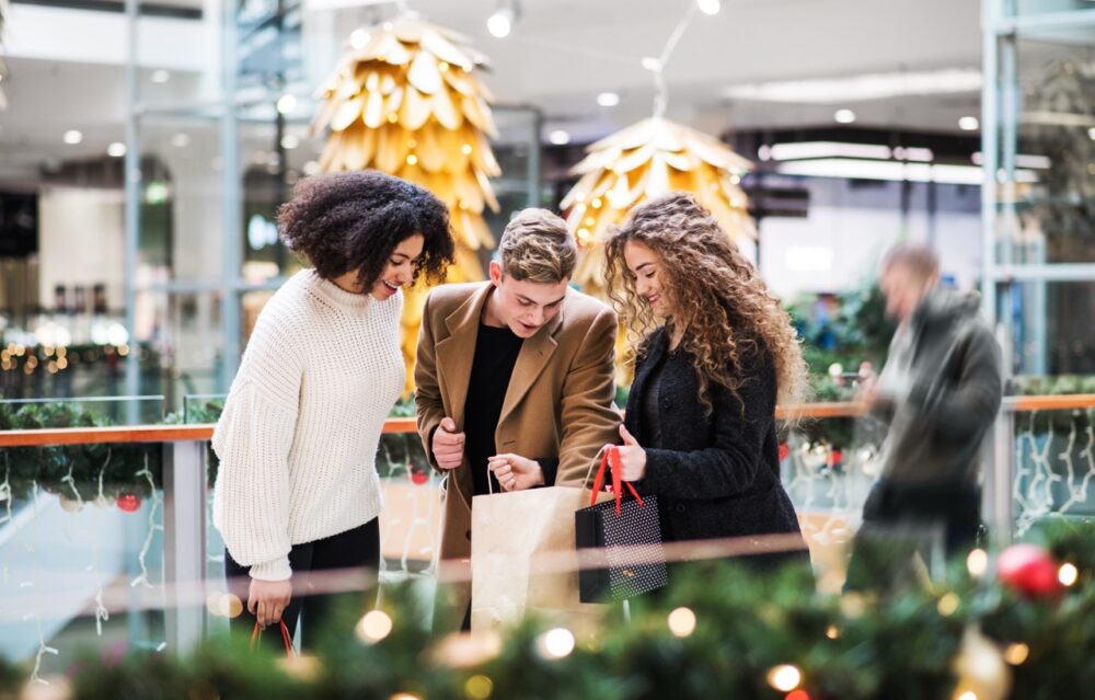 young friends standing in shopping center at chris 2024 10 18 08 31 57 utc Large