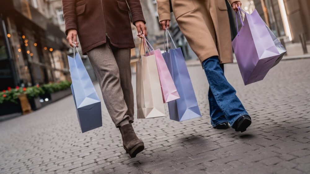 cropped front view of young women with shopping ba 2026 03 17 06 40 25 utc Large