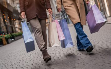 cropped front view of young women with shopping ba 2026 03 17 06 40 25 utc Large