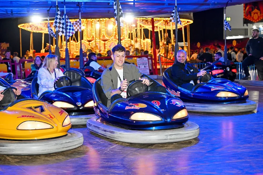 Enjoying the rides at the retail technology show big party