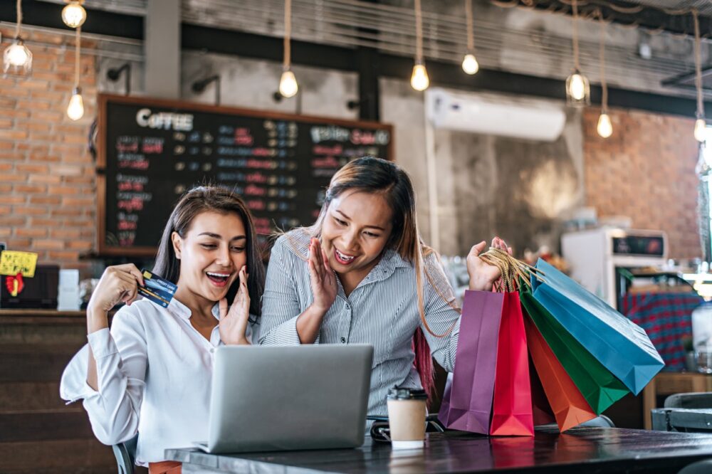 excited women shop online using credit card 2026 01 07 00 54 00 utc Large
