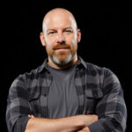 Cloudinary Aaron Smedley standing checks