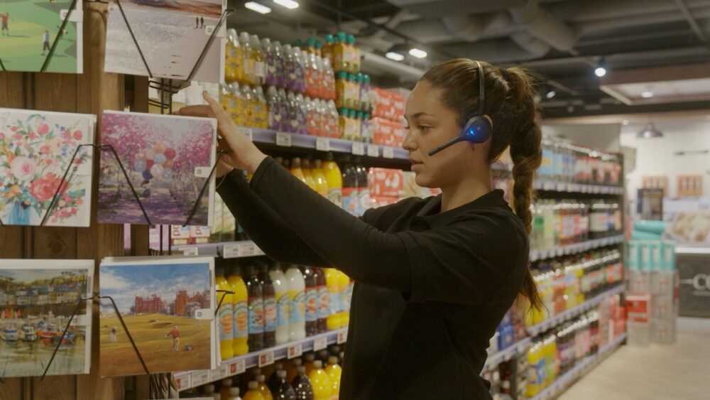 Colleague using Quail Digital's new Pro12 Retail Headset System