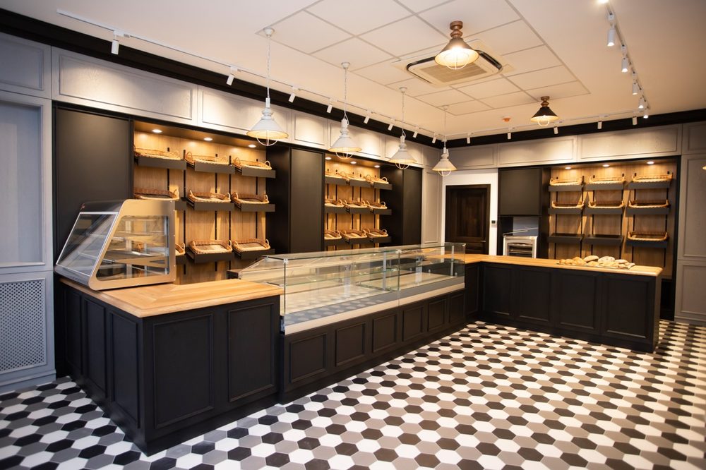 inside a bakery with baskets and black counters 2026 09 22 03 26 42 utc Large