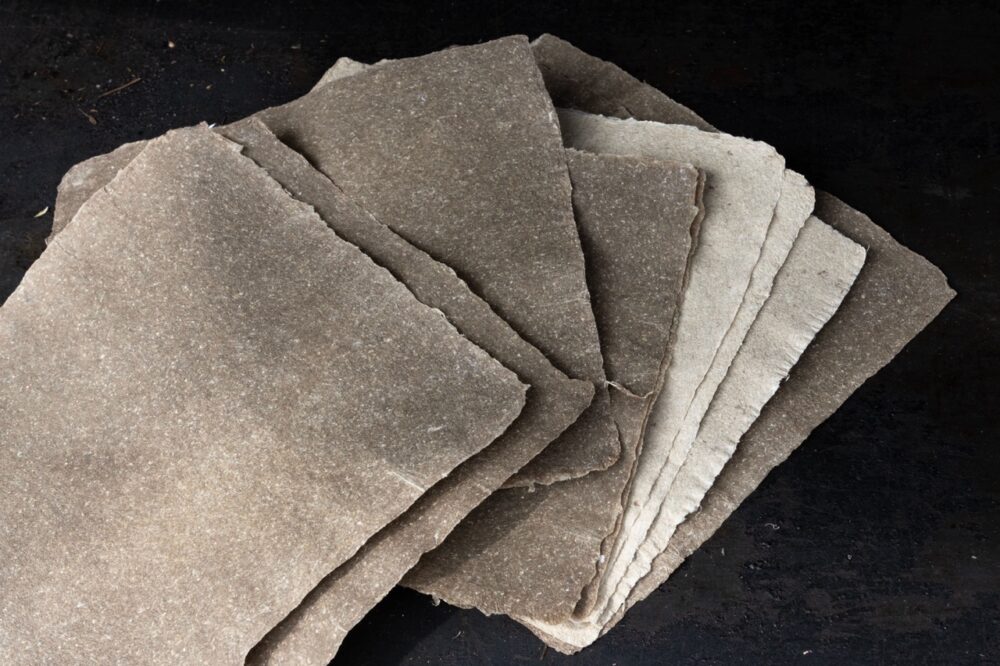 Properties, Benefits And Applications Of Different Mica Sheets 1 pile of gray paper sheets on a black surface 2026 01 07 23 49 41 utc Large