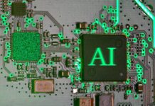 Circuit board with a processor chip marked AI, surrounded by components and glowing green circuit traces