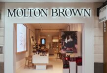 Molton Brown Scent Pavilion shopfront at Bluewater with illuminated signage and a festive window display