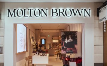 Molton Brown Opens First Scent Pavilion At Bluewater Molton Brown Scent Pavilion shopfront at Bluewater with illuminated signage and a festive window display