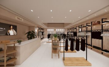 Visualisation of the TALA pop-up at Bicester Village, with clothing rails, wooden shelving, a cash desk and a screen showing a TALA campaign image